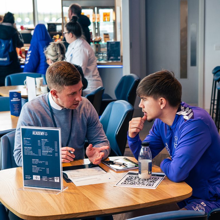Kyzen Co-founder Jack Mackreth sat down discussing taxes with a footballer in an Everton kit